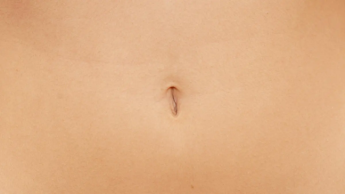 close up of woman navel