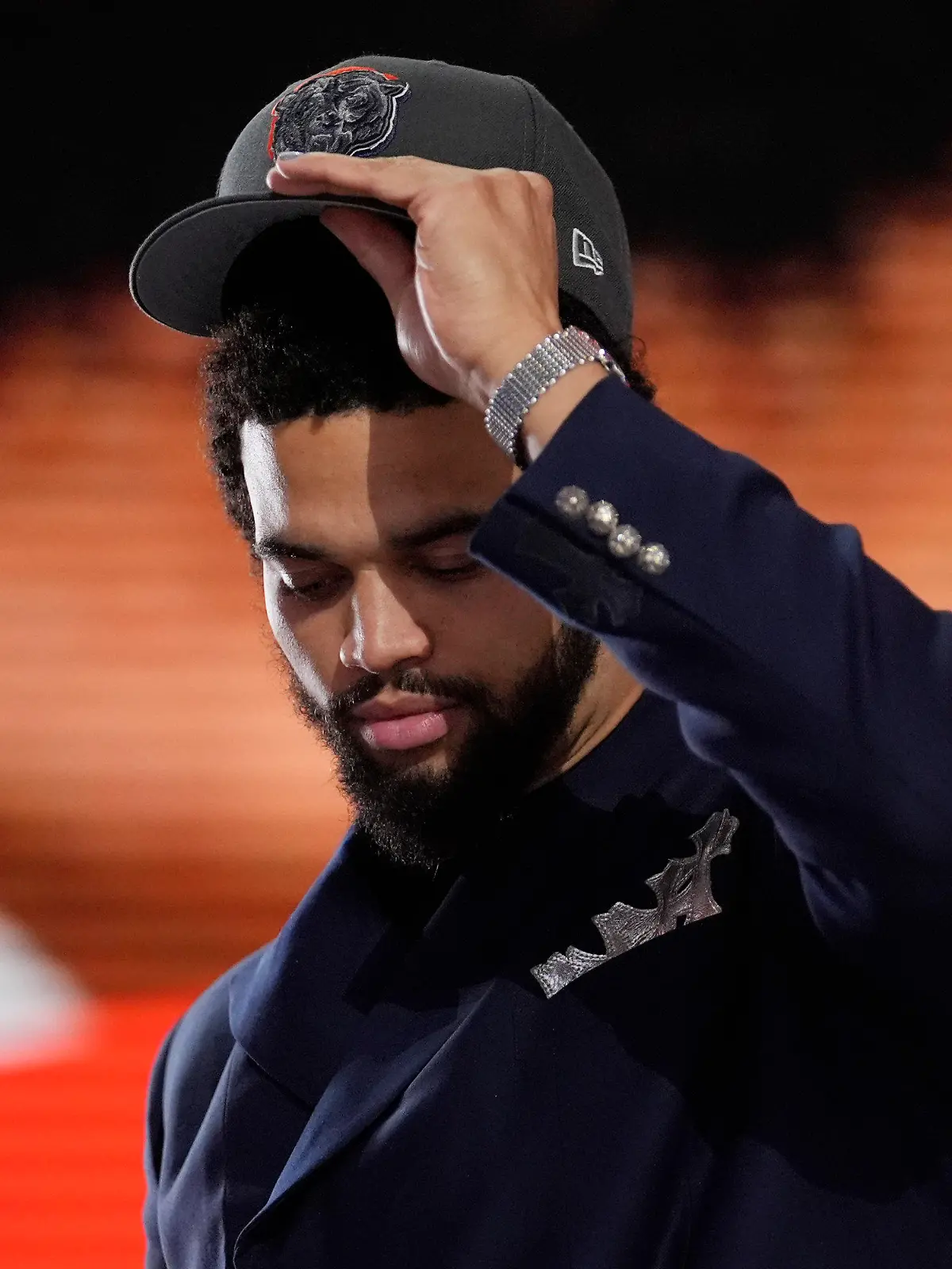 Southern California quarterback Caleb Williams celebrates after being chosen by the Chicago Bears with the first overall pick during the first round of the NFL football draft, Thursday, April 25, 2024, in Detroit. (AP Photo/Jeff Roberson)