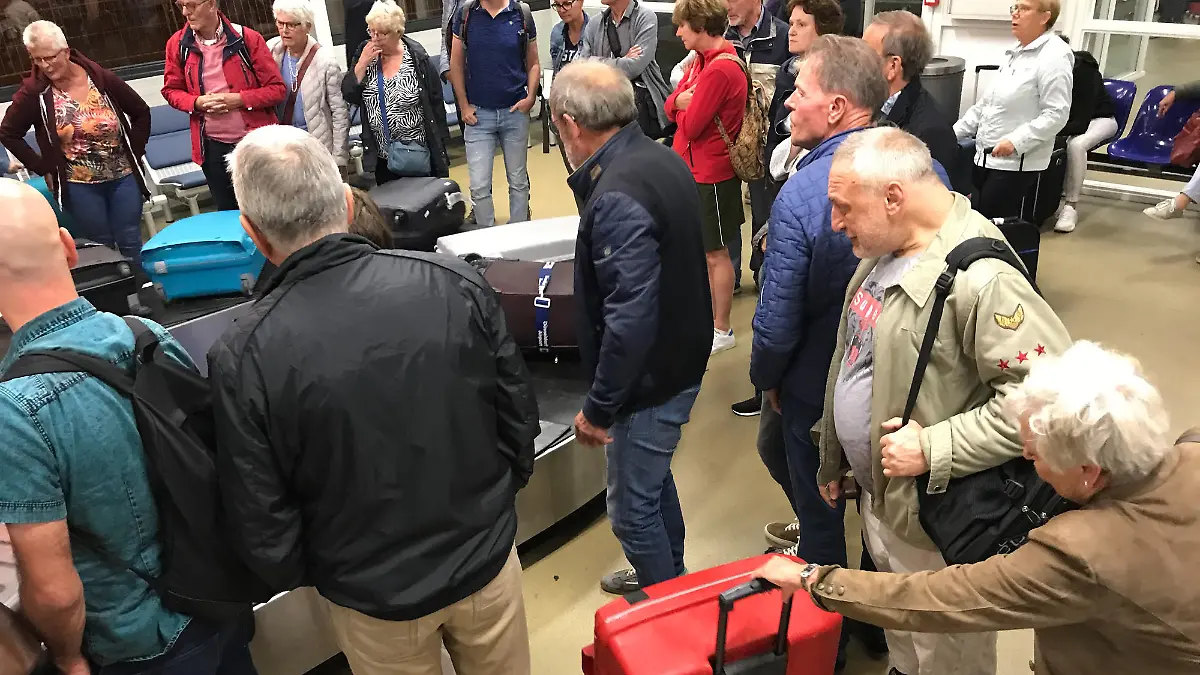 Ohrid, Macadonia, - September 19, 2019. Passengers arriving o a rainy day at Ohrid st Paul the Apostel Airport.