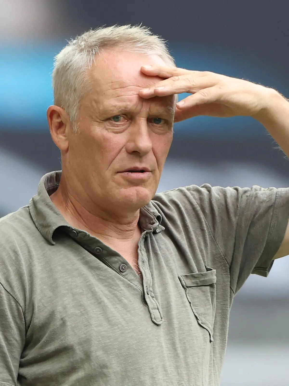 AUGSBURG, GERMANY - AUGUST 06: Christian Streich, head coach of Freiburg looks on during the Bundesliga match between FC Augsburg and Sport-Club Freiburg at WWK-Arena on August 06, 2022 in Augsburg, Germany. (Photo by Alexander Hassenstein/Getty Images)