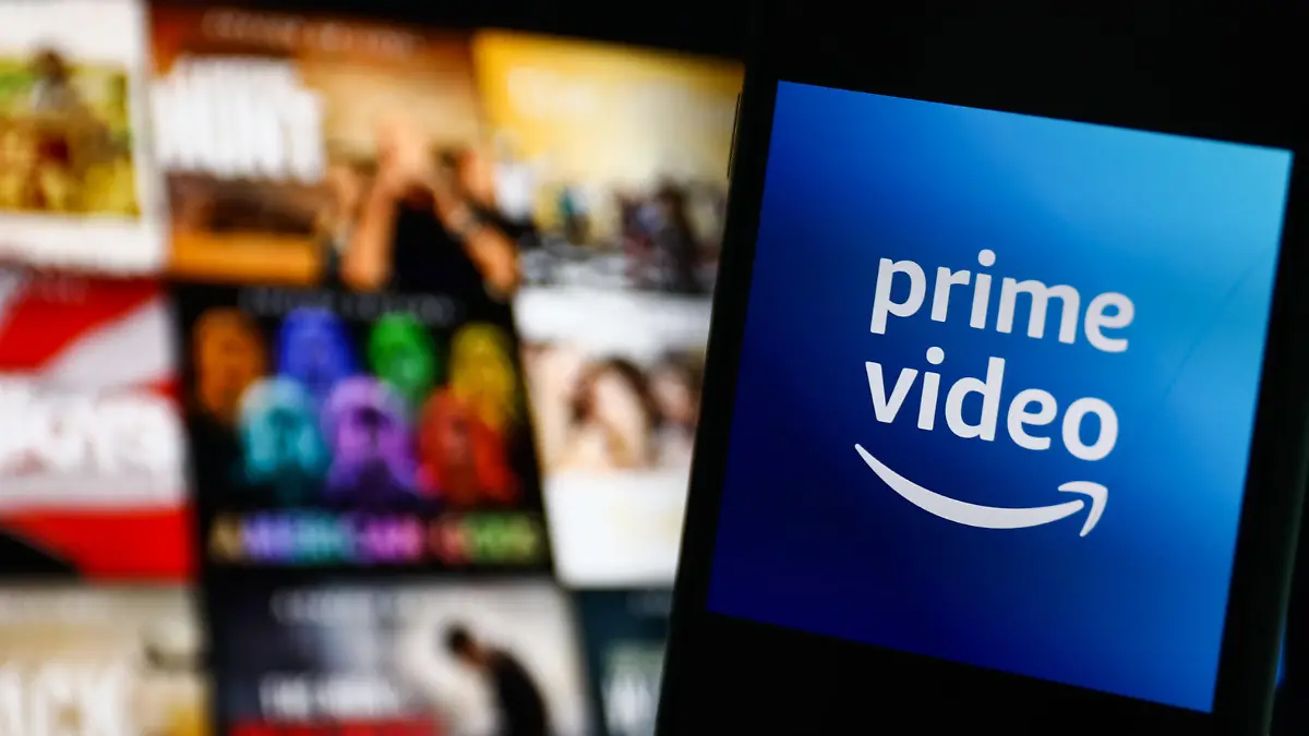 Amazon Prime Video logo displayed on a phone screen and Amazon Prime Video website displayed on a screen in the background are seen in this illustration photo taken in Krakow, Poland on July 26, 2022. (Photo by Jakub Porzycki/NurPhoto)