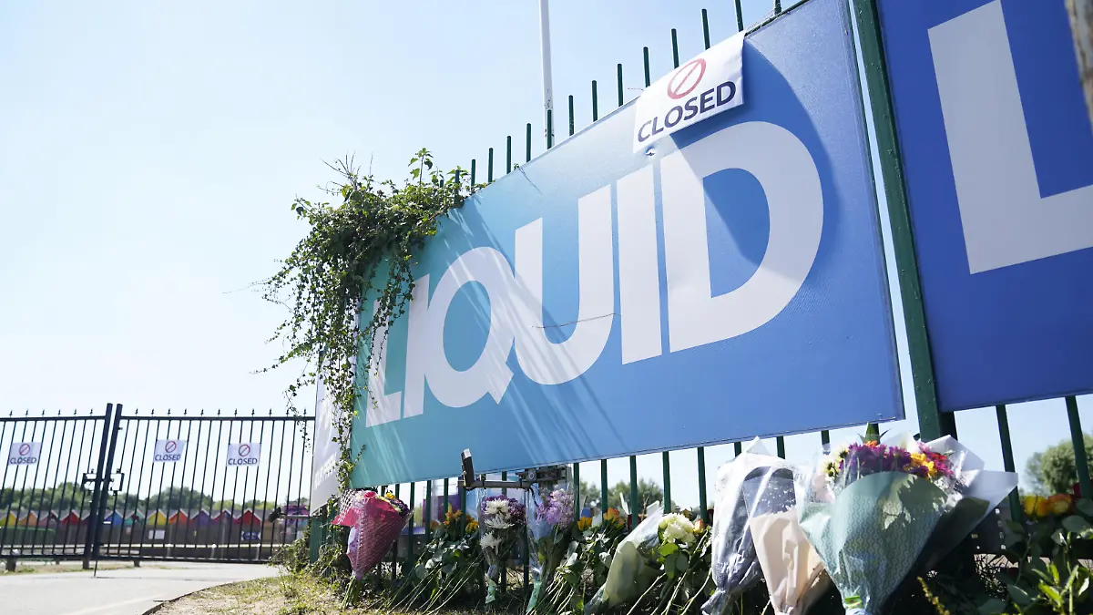 Liquid Leisure death. Flowers are left outside Liquid Leisure in Windsor, following the death of an 11-year-old girl. Emergency services were called at around 3.55pm on Saturday to reports of the child getting into difficulty at the water park near Datchet. Picture date: Sunday August 7, 2022. She was found at around 5.10pm and rushed to Wexham Park Hospital but died. See PA story POLICE Waterpark. Photo credit should read: Andrew Matthews/PA Wire URN:68210464