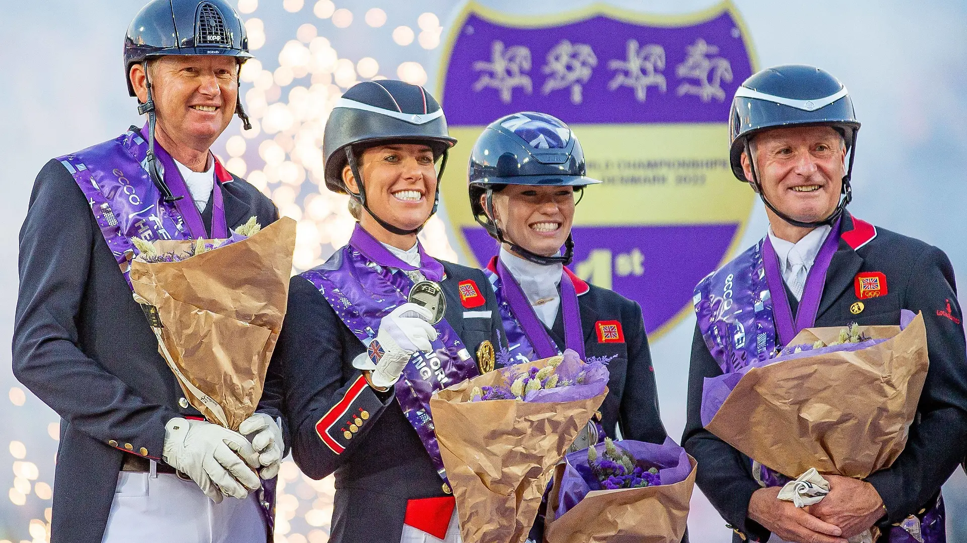 Mandatory Credit: Photo by Elli Birch/IPS/Shutterstock 13074333cj L-R Gareth Hughes, Charlotte Dujardin Charlotte Fry Richard Davison Silver Medal winners Team GB in the Grand Prix de Dressage Team Championship Herning 2022. Blue Hors FEI World Dressage Team Championship Grand Prix at The FEI World Championships Herning 2022. Herning. DEN. - 07 Aug 2022 Herning 2022. Blue Hors FEI World Dressage Team Championship Grand Prix at The FEI World Championships Herning 2022. Herning. DEN. - 07 Aug 2022 PUBLICATIONxINxGERxSUIxAUTXHUNxGRExMLTxCYPxROMxBULxUAExKSAxONLY Copyright: xEllixBirch/IPS/Shutterstockx 13074333cj