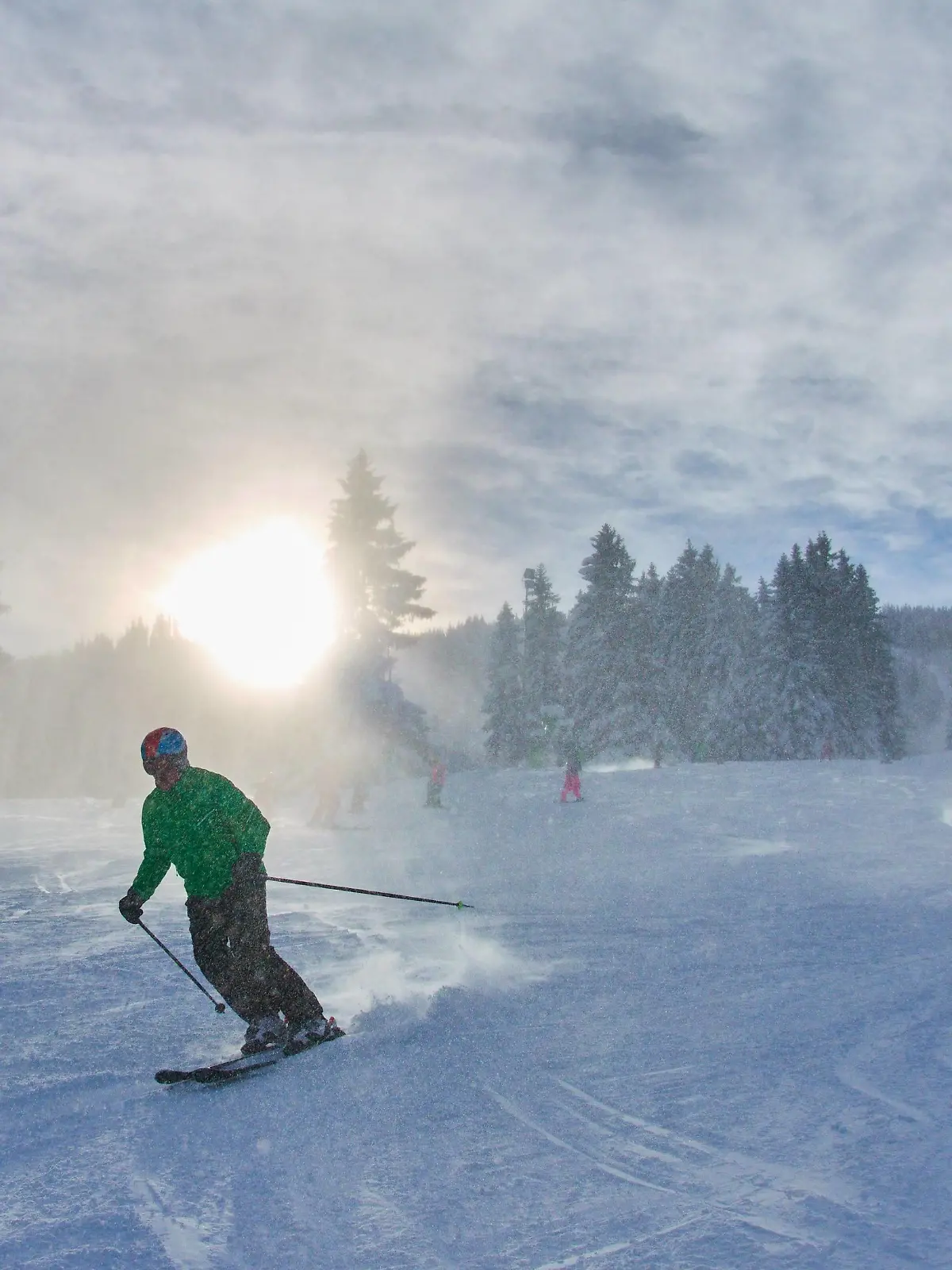 Skier in action take the lift Alpspitzbahn up to the mountain Alpspitz to run down the slopes along iced forest in Nesselwang, Allgäu, Bavaria, Germany, January 11, 2019. Photographer: Peter Schatz  