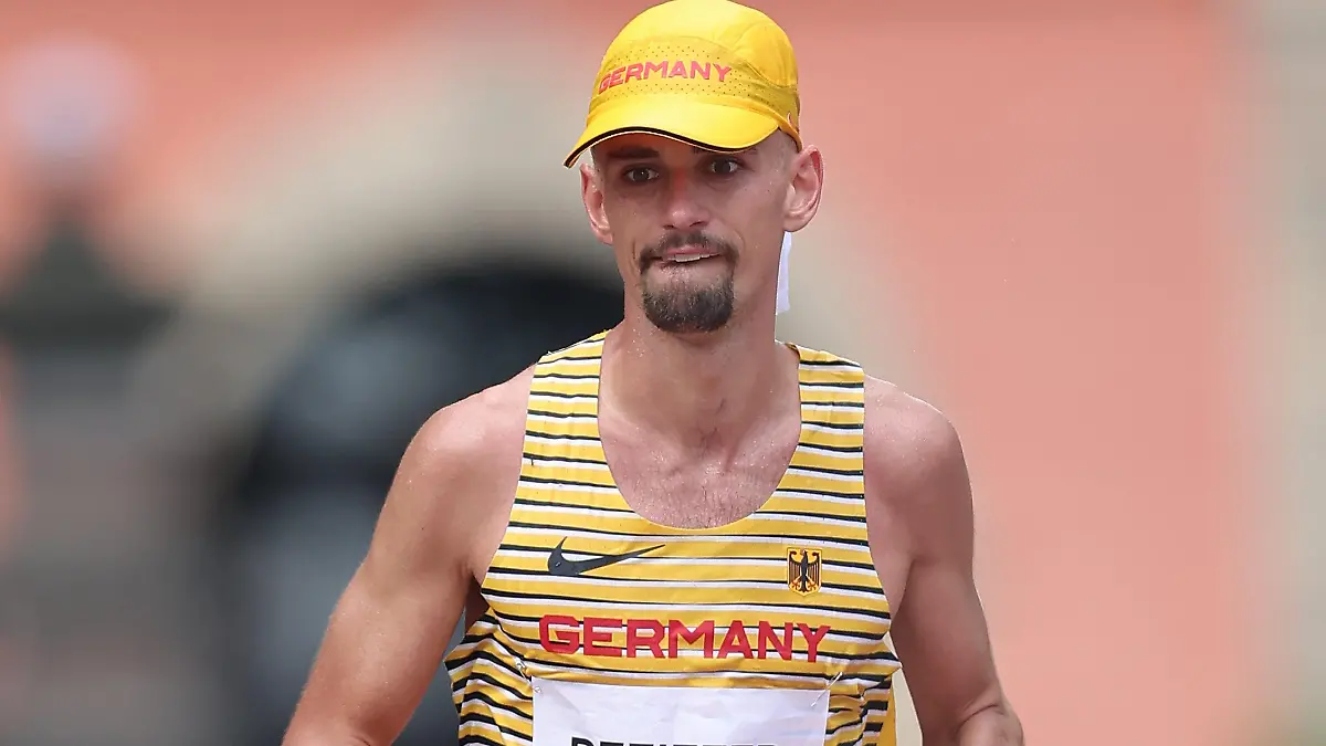 SAPPORO, JAPAN - AUGUST 08:  Hendrik Pfeiffer of Team Germany competes in the Men's Marathon Final on day sixteen of the Tokyo 2020 Olympic Games at Sapporo Odori Park on August 08, 2021 in Sapporo, Japan.  (Photo by Lintao Zhang/Getty Images)