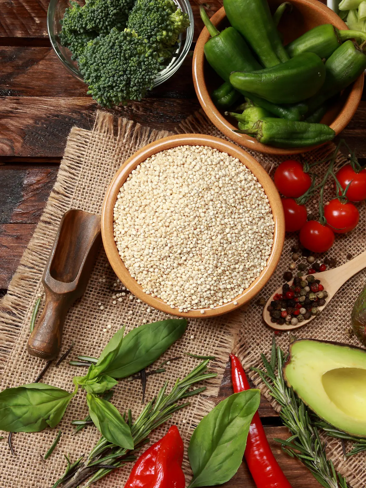 Quinoa Seeds main subject of healthy food contain Protein Vitamin B and Dietary Minerals surrounded with Vegetables
