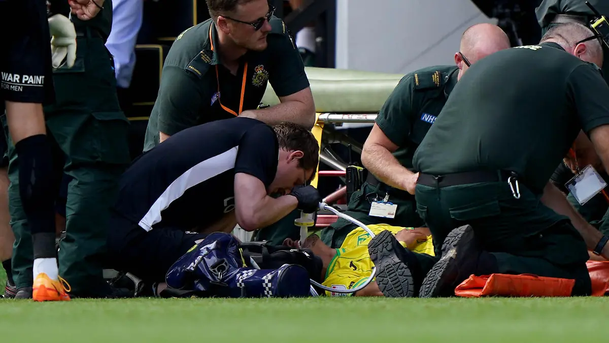 Norwich City v Wigan Athletic - Sky Bet Championship - Carrow Road. Norwich City's Dimitris Giannoulis is treated by medical staff on the pitch after being injured during the Sky Bet Championship match at Carrow Road, Norwich. Picture date: Saturday August 6, 2022. See PA story SOCCER Norwich. Photo credit should read: Joe Giddens/PA Wire. RESTRICTIONS: EDITORIAL USE ONLY No use with unauthorised audio, video, data, fixture lists, club/league logos or "live" services. Online in-match use limited to 120 images, no video emulation. No use in betting, games or single club/league/player publications. URN:68195065