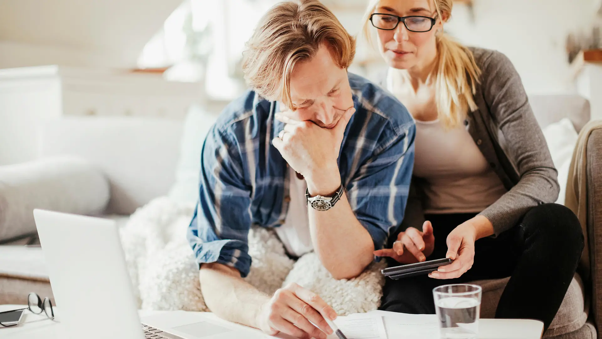 Photo of a mature couple calculating home finances
