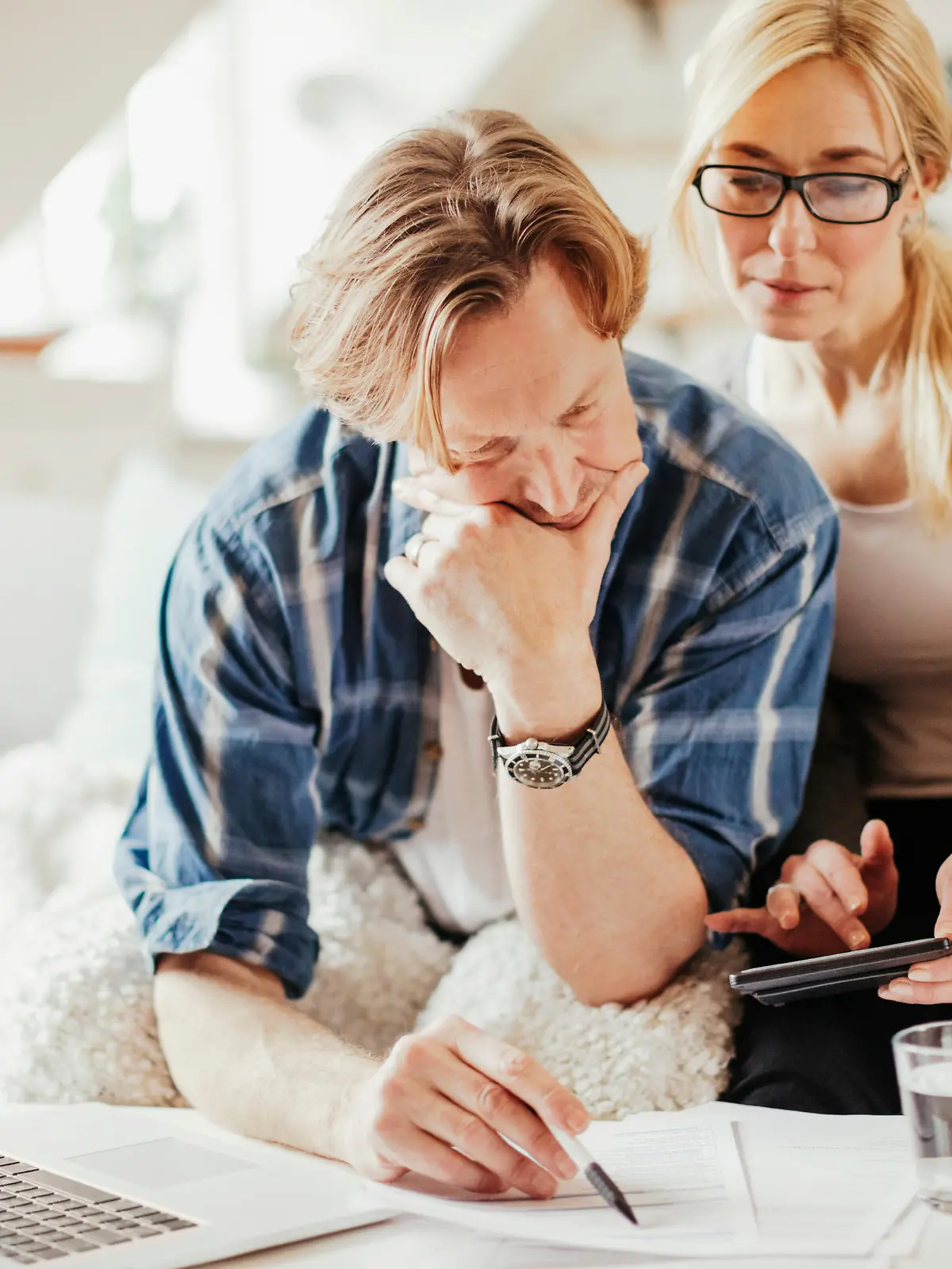 Photo of a mature couple calculating home finances