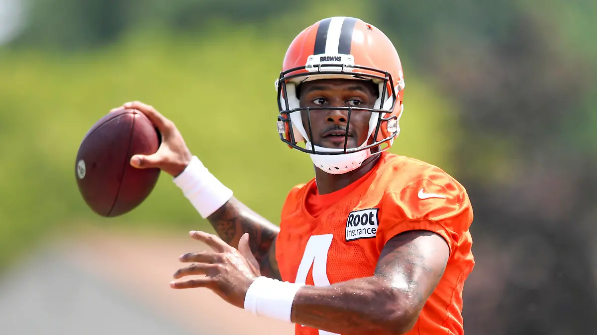 Cleveland Browns quarterback Deshaun Watson prepares to throw a pass during the NFL football team's training camp, Monday, Aug. 1, 2022, in Berea, Ohio. (AP Photo/Nick Cammett)