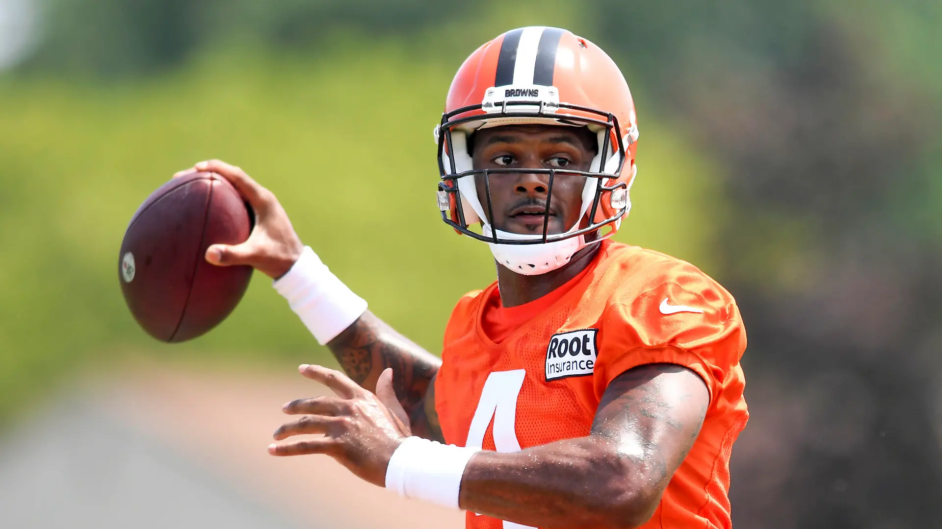Cleveland Browns quarterback Deshaun Watson prepares to throw a pass during the NFL football team's training camp, Monday, Aug. 1, 2022, in Berea, Ohio. (AP Photo/Nick Cammett)