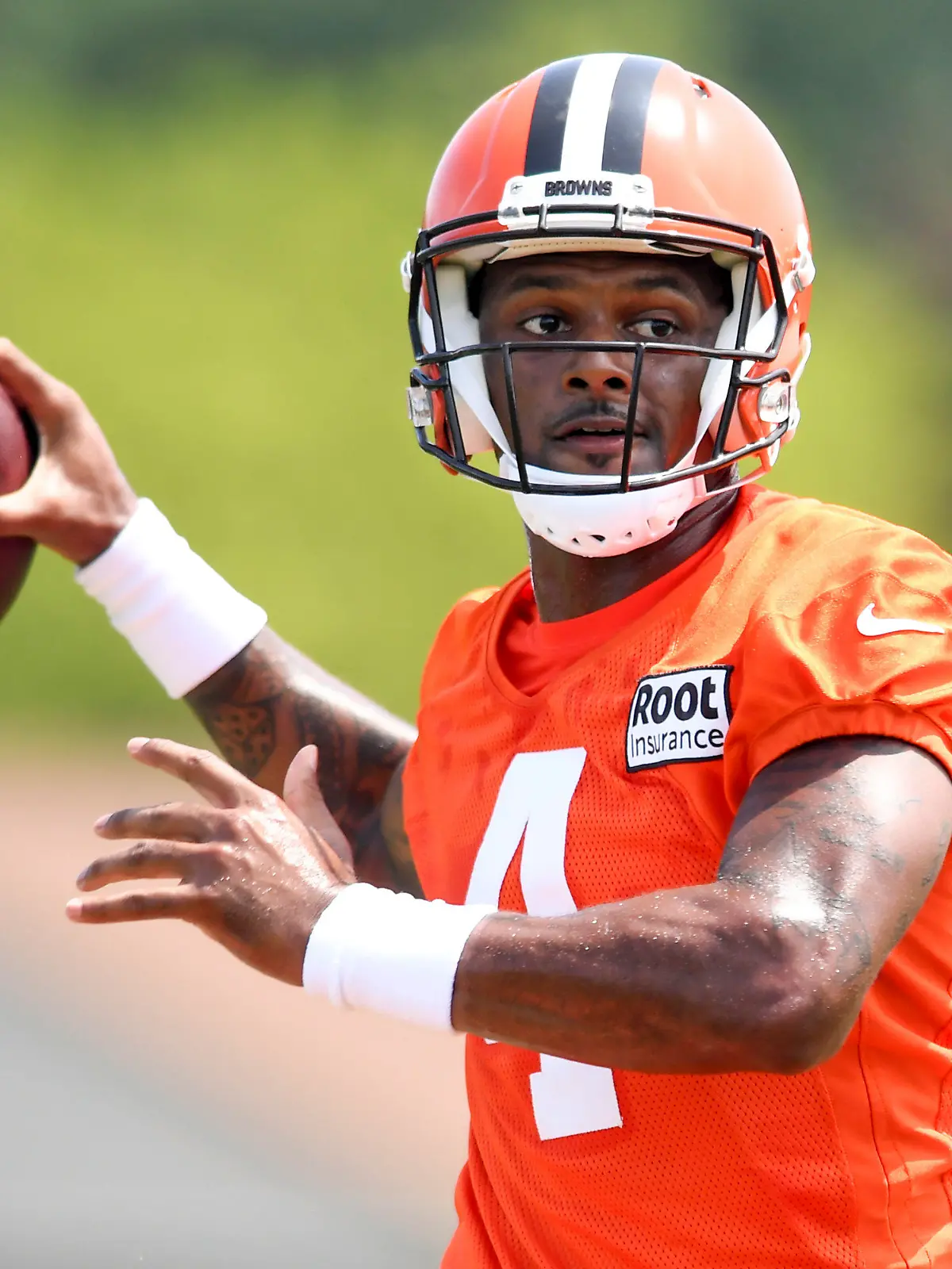 Cleveland Browns quarterback Deshaun Watson prepares to throw a pass during the NFL football team's training camp, Monday, Aug. 1, 2022, in Berea, Ohio. (AP Photo/Nick Cammett)
