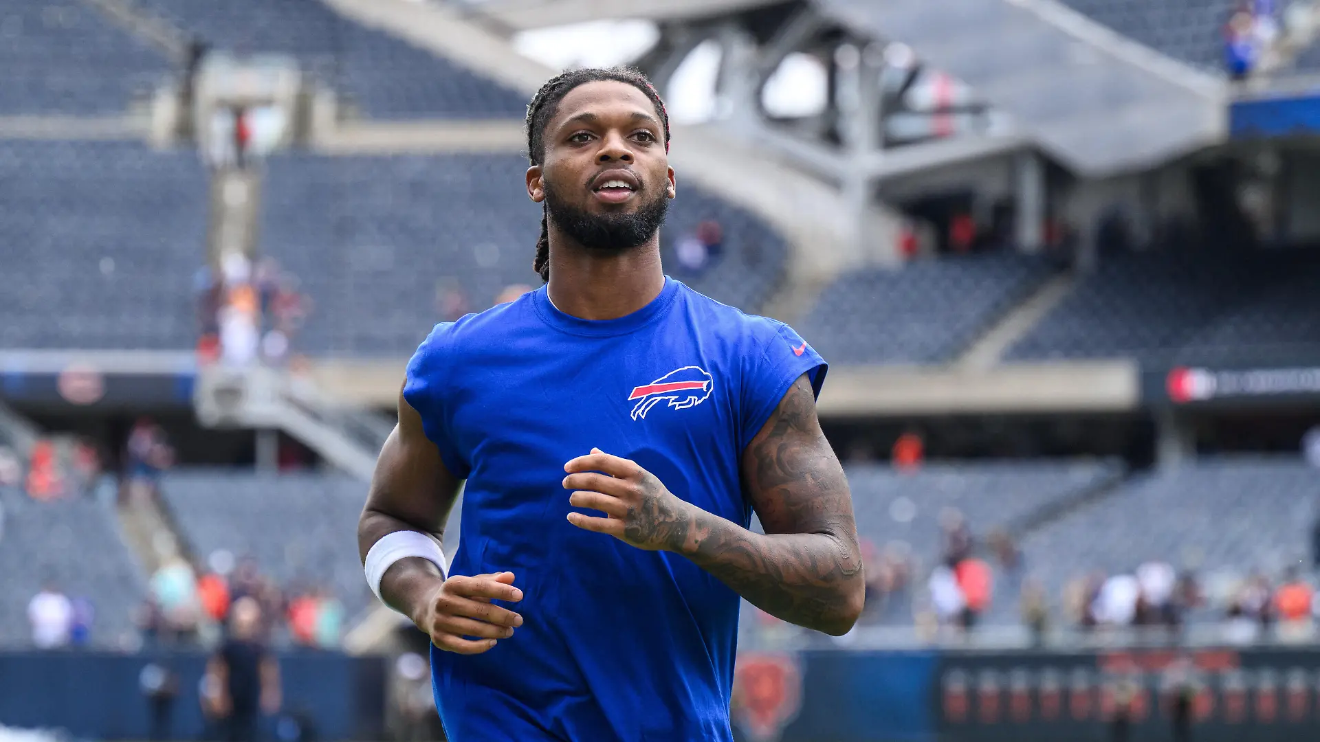 Aug 26, 2023; Chicago, Illinois, USA; Buffalo Bills safety Damar Hamlin (3) runs off the field after a game against the Chicago Bears at Soldier Field. Mandatory Credit: Daniel Bartel-USA TODAY Sports