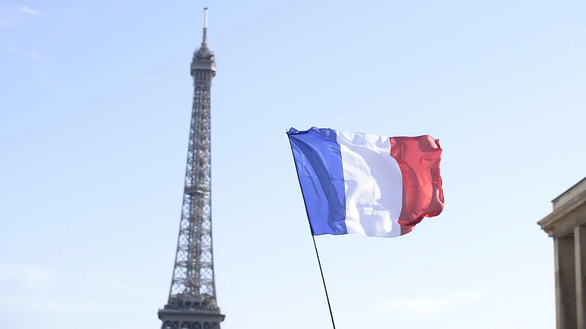 Participants wave flags and banners during a demonstration called for by the movement 'La Manif pour tous' against what are seen as 'new offensives against the family and education' in Paris, France, on October 16, 2016. Photo by Eliot Blondet/ABACAPRESS.COM