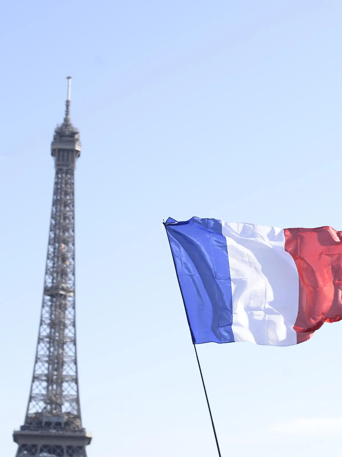 Participants wave flags and banners during a demonstration called for by the movement 'La Manif pour tous' against what are seen as 'new offensives against the family and education' in Paris, France, on October 16, 2016. Photo by Eliot Blondet/ABACAPRESS.COM