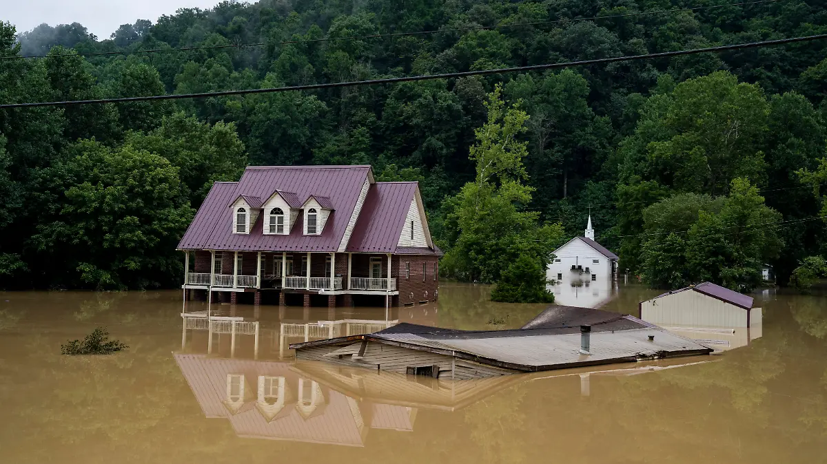 JACKSON, KY - JULY 29:  A house is seen almost completely submerged off of the Bert T Combs Mountain Parkway on July 29, 2022 in Breathitt County, Kentucky. At least 16 people have been killed and hundreds had to be rescued amid flooding from heavy rainfall. 
 (Photo by Michael Swensen/Getty Images)