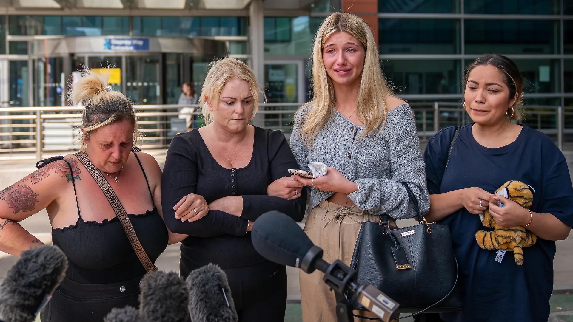 Archie Battersbee court case. Hollie Dance (second left) surrounded by family and friends, outside the Royal London hospital in Whitechapel, east London, speaking to media following the death of her 12 year old son Archie Battersbee. Picture date: Saturday August 6, 2022. The 12-year-old had been in a coma since he was found unconscious in April and was being kept alive by a combination of medical interventions, including ventilation and drug treatments, at the hospital. See PA story COURTS Archie. Photo credit should read: Aaron Chown/PA Wire URN:68195309