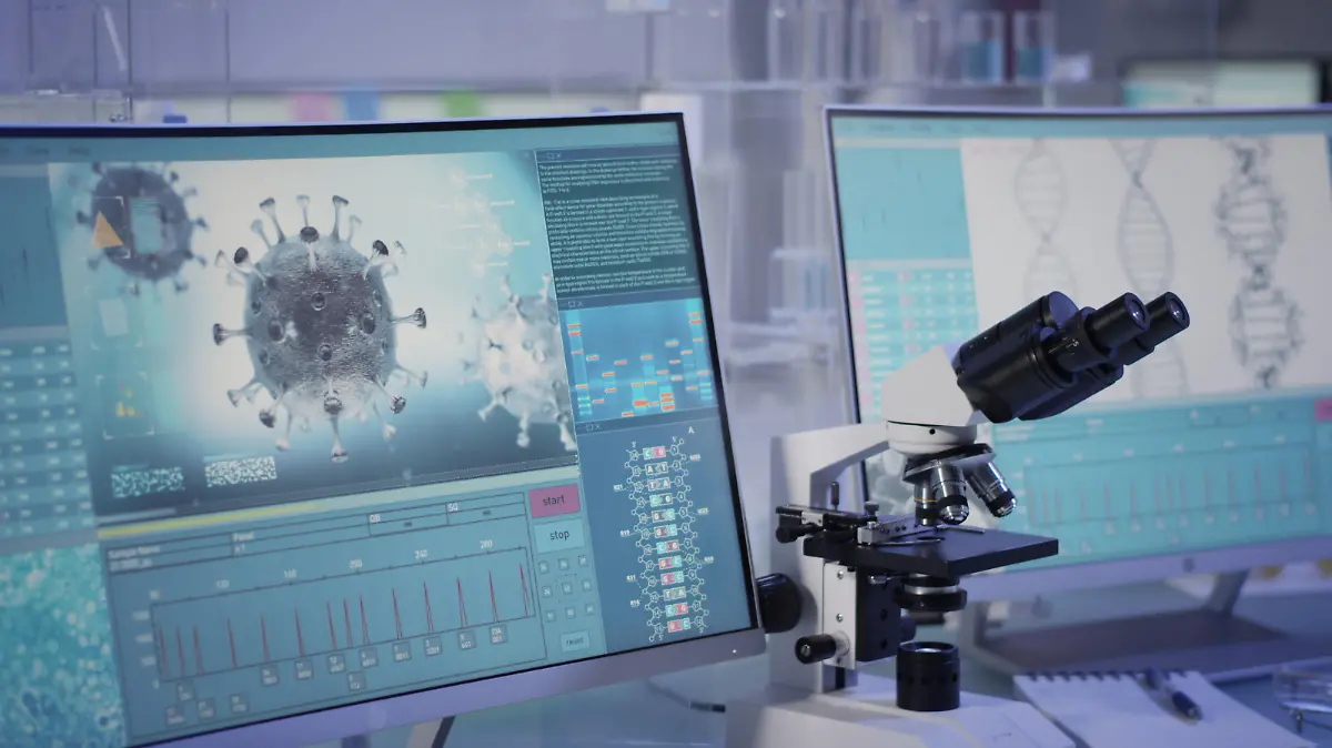 Modern laboratory interior. Coronavirus research. Word Covid-19 on the screen