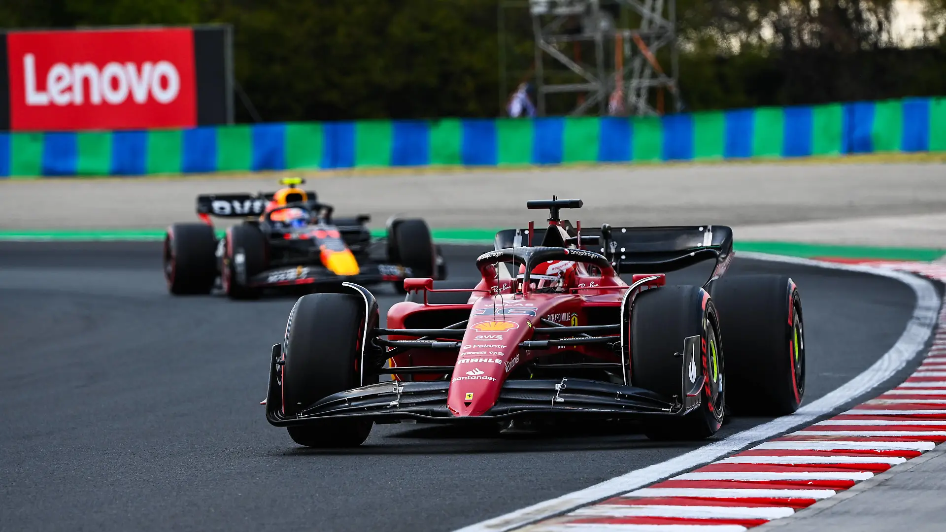 Formula 1 2022: Hungarian GP HUNGARORING, HUNGARY - JULY 29: Charles Leclerc, Ferrari F1-75, leads Sergio Perez, Red Bull Racing RB18 during the Hungarian GP at Hungaroring on Friday July 29, 2022 in Budapest, Hungary. Photo by Mark Sutton / Sutton Images Images PUBLICATIONxINxGERxSUIxAUTxHUNxONLY GP2213_134436MS1_3860