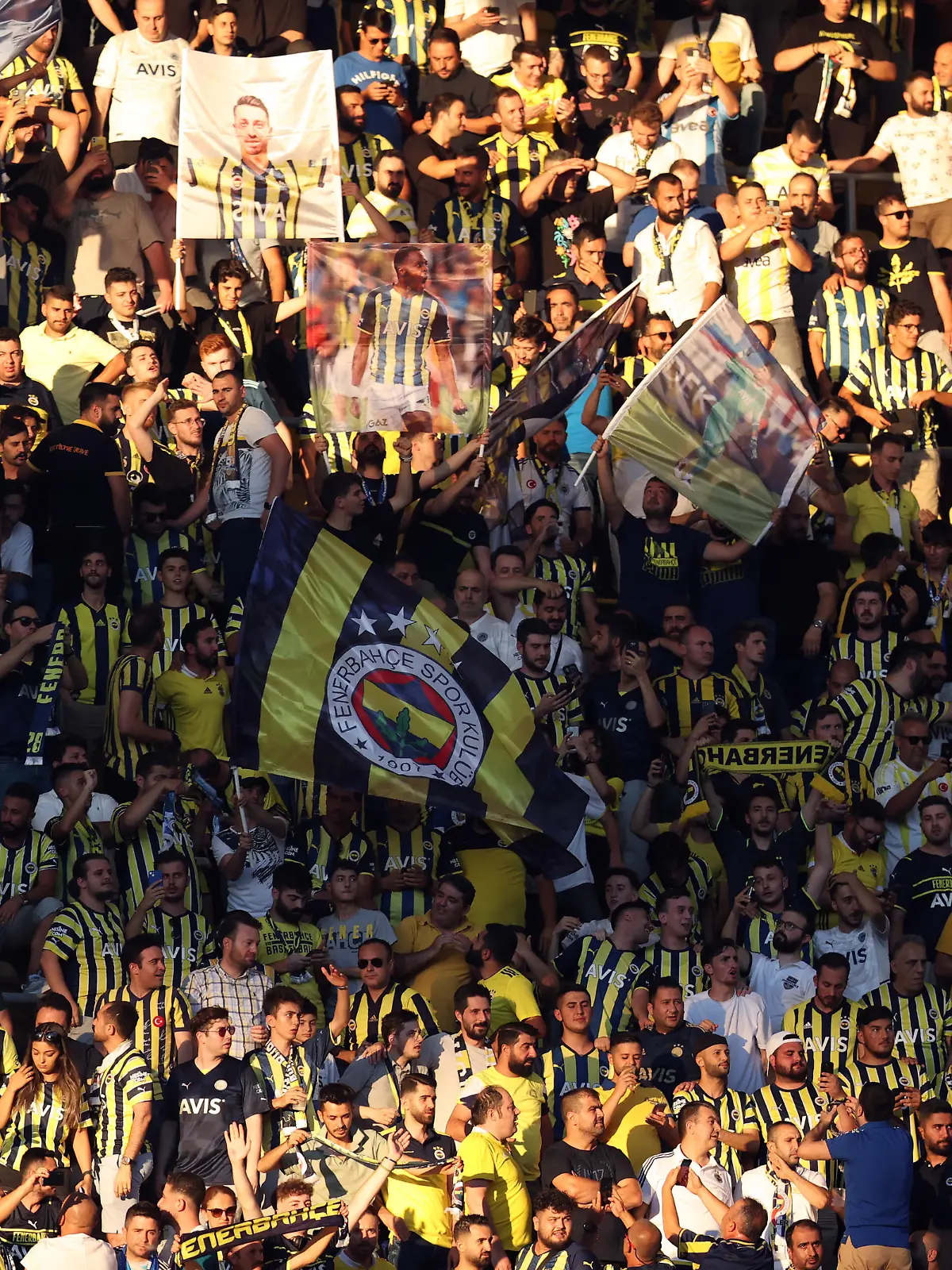 ISTANBUL, TURKIYE - JULY 27: Supporters of Fenerbahce cheer during UEFA Champions League second qualifying round 2nd leg match between Fenerbahce and Dynamo Kyiv at Ulker Stadium in Istanbul, Turkiye on July 27, 2022. Ali Atmaca / Anadolu Agency