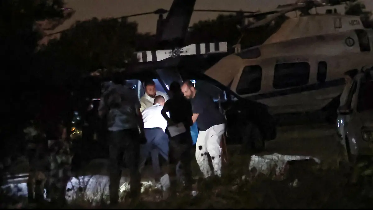 Pictured: Emergency services at the scene of the incident involving a man in his twenties who died when a rear helicopter propeller hit him in Spata, near Athens, Greece. Monday 25 July 2022
Re: A man in his twenties, believed to be from the UK, has died when a rear propeller of a helicopter hit him after landing near Athens Greece.
According to local reports, the unidentified man landed in a Bell 407 helicopter, travelling from Mykonos and owned by Superior Air at their helipad in the Spata suburb of Athens.
A second helicopter with the man's parents had to be diverted to Athens International Airport nearby to prevent the man's parents witnessing the scene of the tragic accident.
Police and ambulance service attended the scene.
