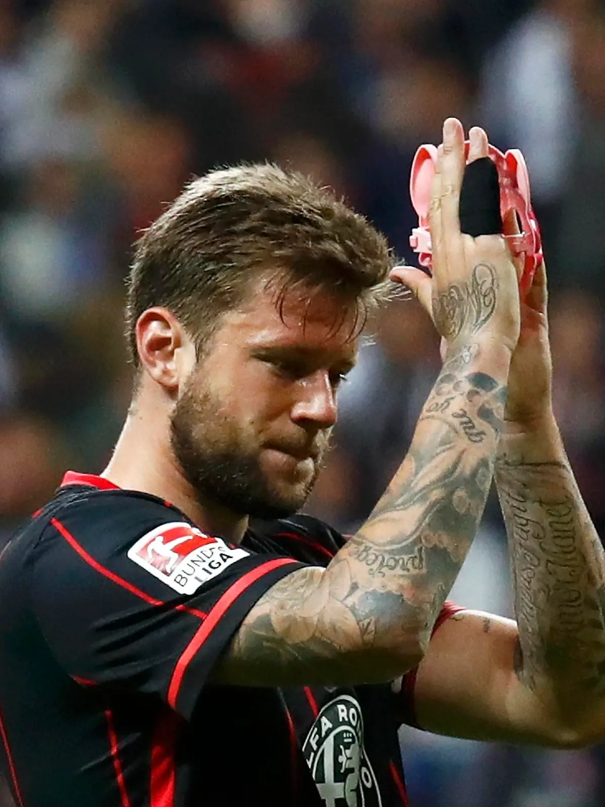Football Soccer - Eintracht Frankfurt v Nuremberg  - German Bundesliga - Relegation Play-off  First Leg - Commerzbank Arena, Frankfurt, Germany - 19/05/16. Eintracht Frankfurt's Marco Russ after the match.   REUTERS/Kai Pfaffenbach  DFB RULES PROHIBIT USE IN MMS SERVICES VIA HANDHELD DEVICES UNTIL TWO HOURS AFTER A MATCH AND ANY USAGE ON INTERNET OR ONLINE MEDIA SIMULATING VIDEO FOOTAGE DURING THE MATCH. 