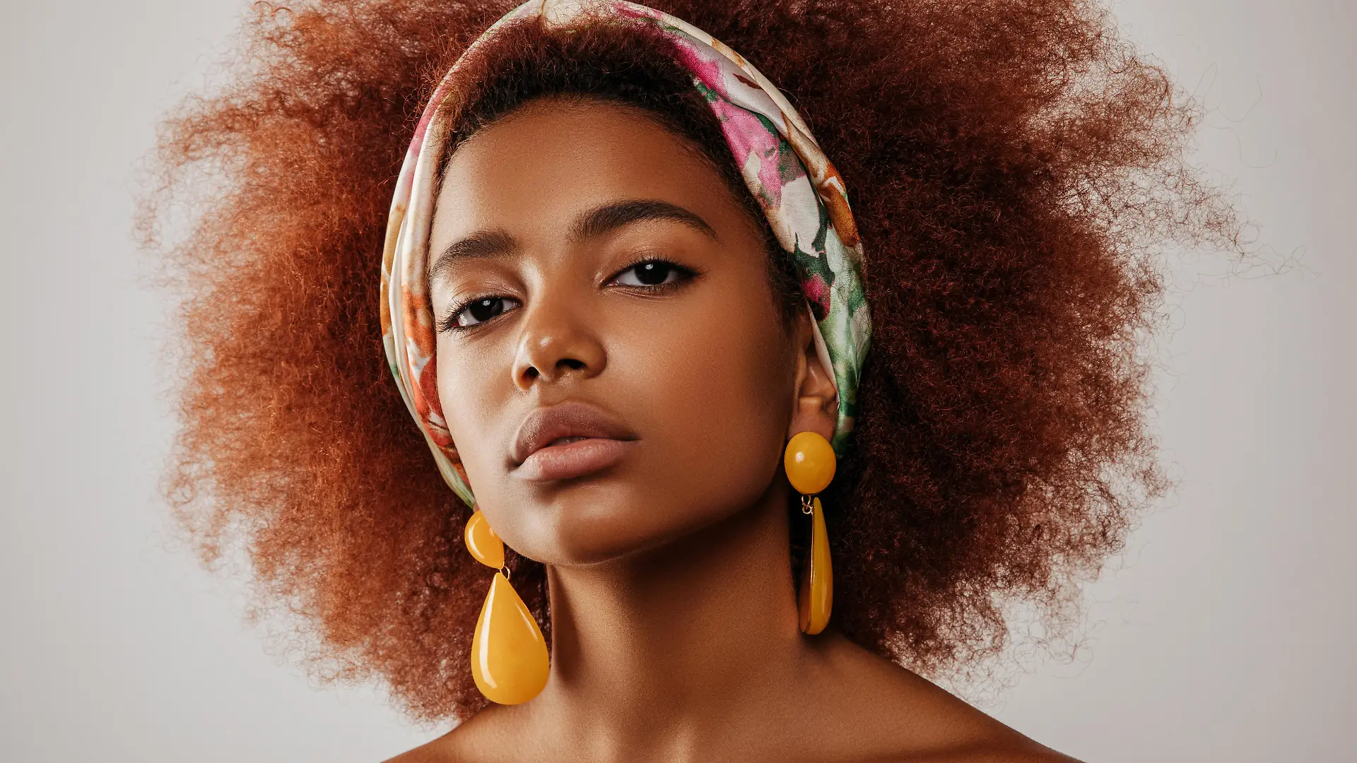 Beautiful afro girl with earrings