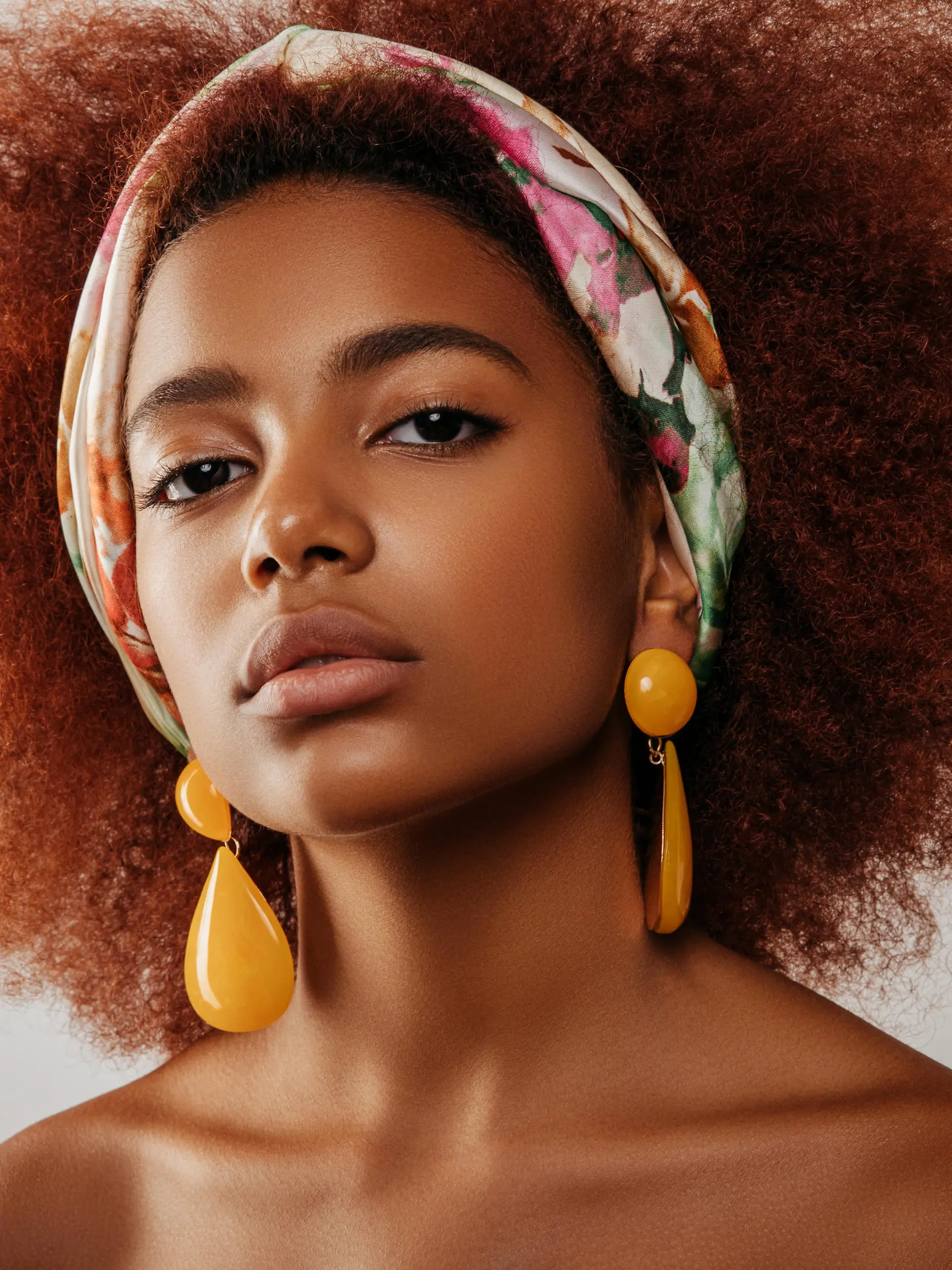 Beautiful afro girl with earrings