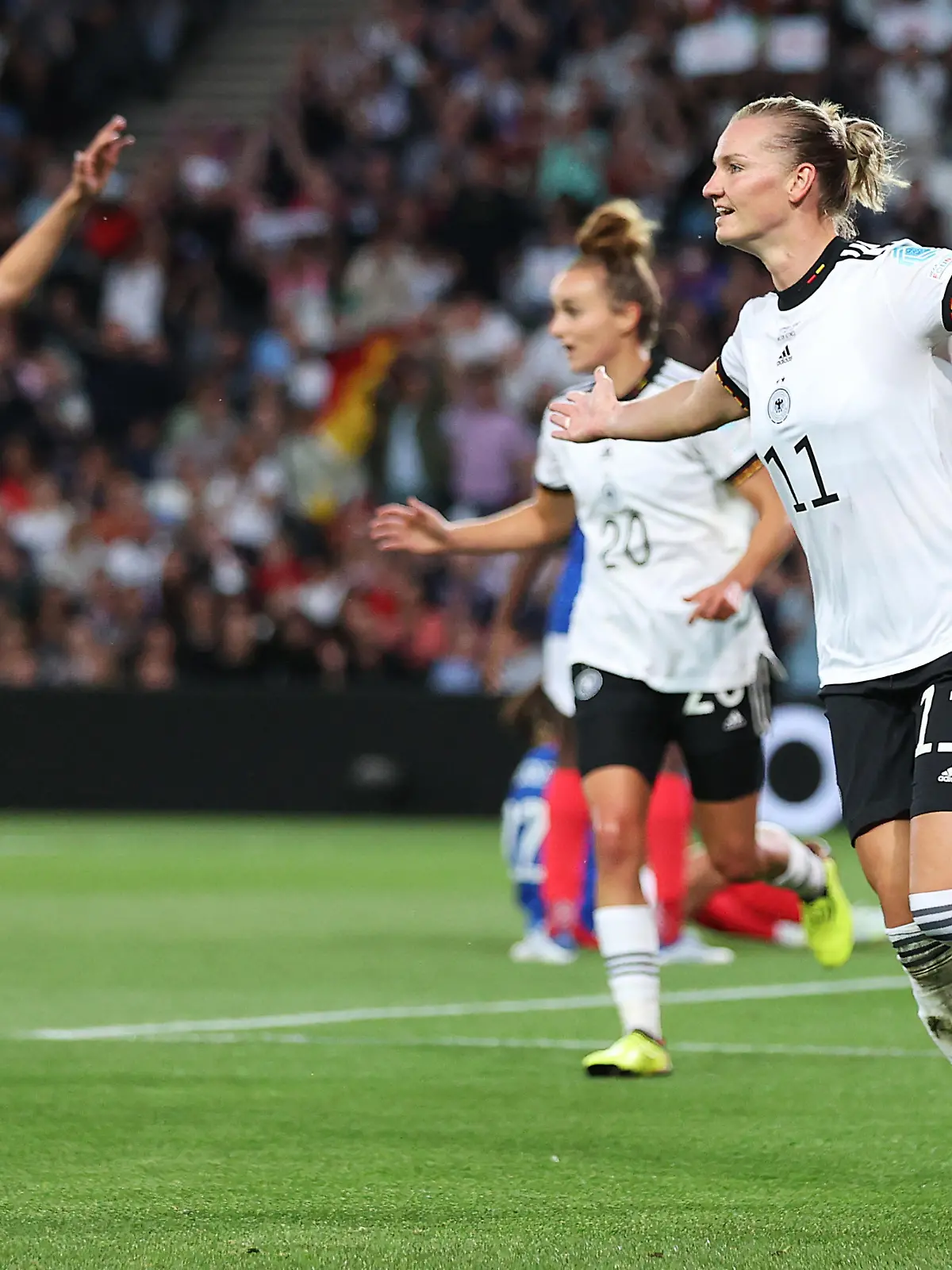 MILTON KEYNES, ENGLAND - JULY 27: Alexandra Popp of Germany celebrates after scoring their side's first goal during the UEFA Women's Euro 2022 Semi Final match between Germany and France at Stadium MK on July 27, 2022 in Milton Keynes, England. (Photo by Alex Pantling/Getty Images)