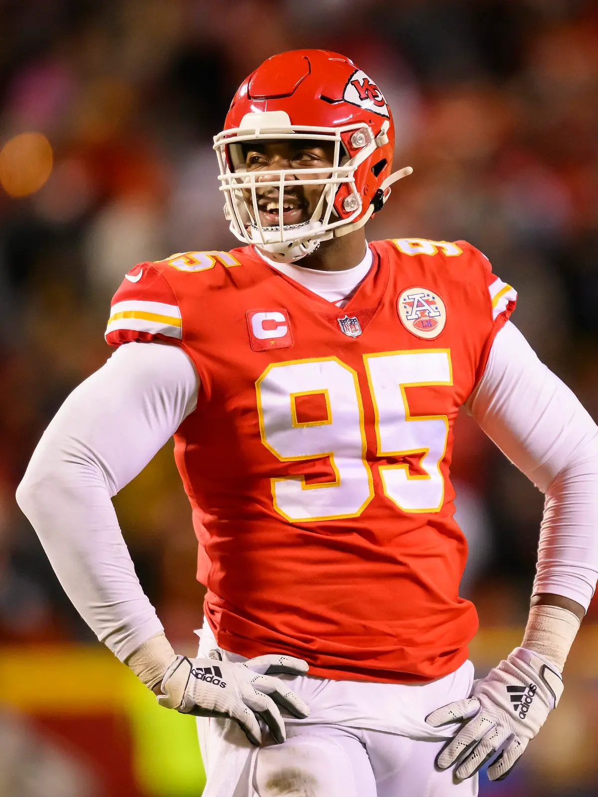 FILE - Kansas City Chiefs defensive tackle Chris Jones smiles during during the second half of the team's NFL AFC championship playoff football game against the Cincinnati Bengals, Jan. 29, 2023 in Kansas City, Mo. Jones, who is entering the final year of his contract with the Chiefs, was absent from the start of Super Bowl champions' mandatory three-day minicamp Tuesday, June 13. (AP Photo/Reed Hoffmann, File)