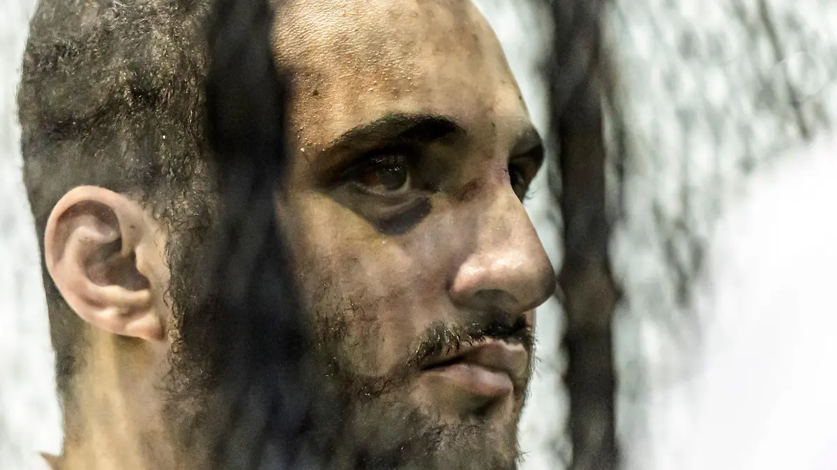 Egyptian Mohamed Adel, the presumed murderer of university of Mansoura student Naira Ashraf, is pictured during his first trial session at the Mansoura courthouse, some 145km north of the capital Cairo, on June 26, 2022. (Photo by Khaled DESOUKI / AFP) (Photo by KHALED DESOUKI/AFP via Getty Images)