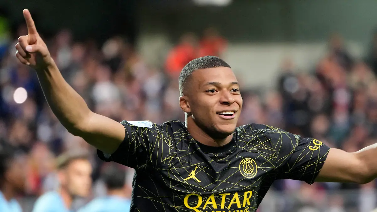 FILE - PSG's Kylian Mbappe celebrates after scoring his side's opening goal during the French League One soccer match between Troyes and Paris Saint Germain, at the Stade de l'Aube, in Troyes, France, Sunday, May 7, 2023. Saudi Arabian soccer team Al-Hilal has made a record $332 million bid for France striker Kylian Mbappe. Paris Saint-Germain has confirmed the offer and says it has given Al-Hilal permission to open negotiations directly with Mbappe. (AP Photo/Lewis Joly, File)