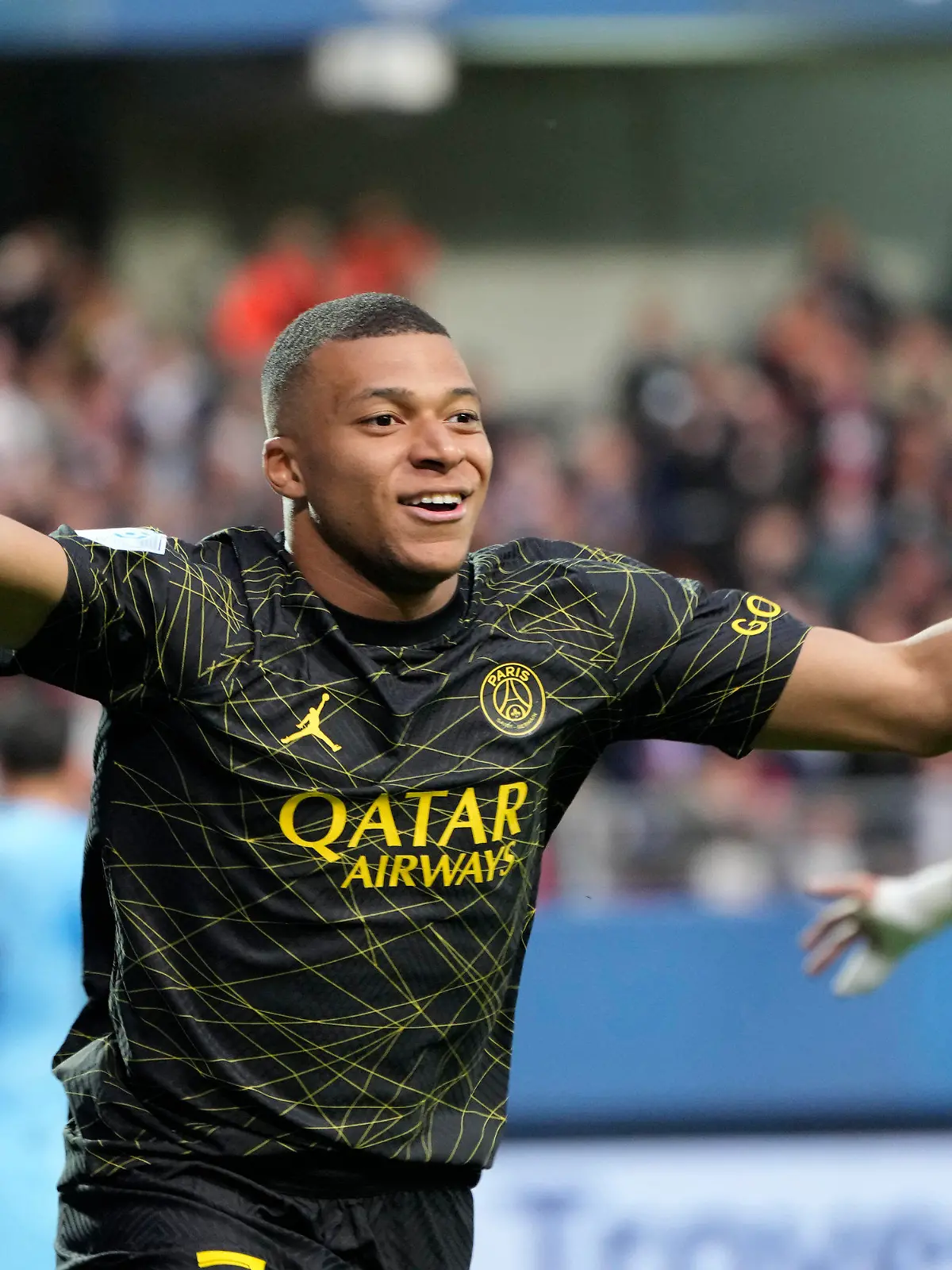 FILE - PSG's Kylian Mbappe celebrates after scoring his side's opening goal during the French League One soccer match between Troyes and Paris Saint Germain, at the Stade de l'Aube, in Troyes, France, Sunday, May 7, 2023. Saudi Arabian soccer team Al-Hilal has made a record $332 million bid for France striker Kylian Mbappe. Paris Saint-Germain has confirmed the offer and says it has given Al-Hilal permission to open negotiations directly with Mbappe. (AP Photo/Lewis Joly, File)