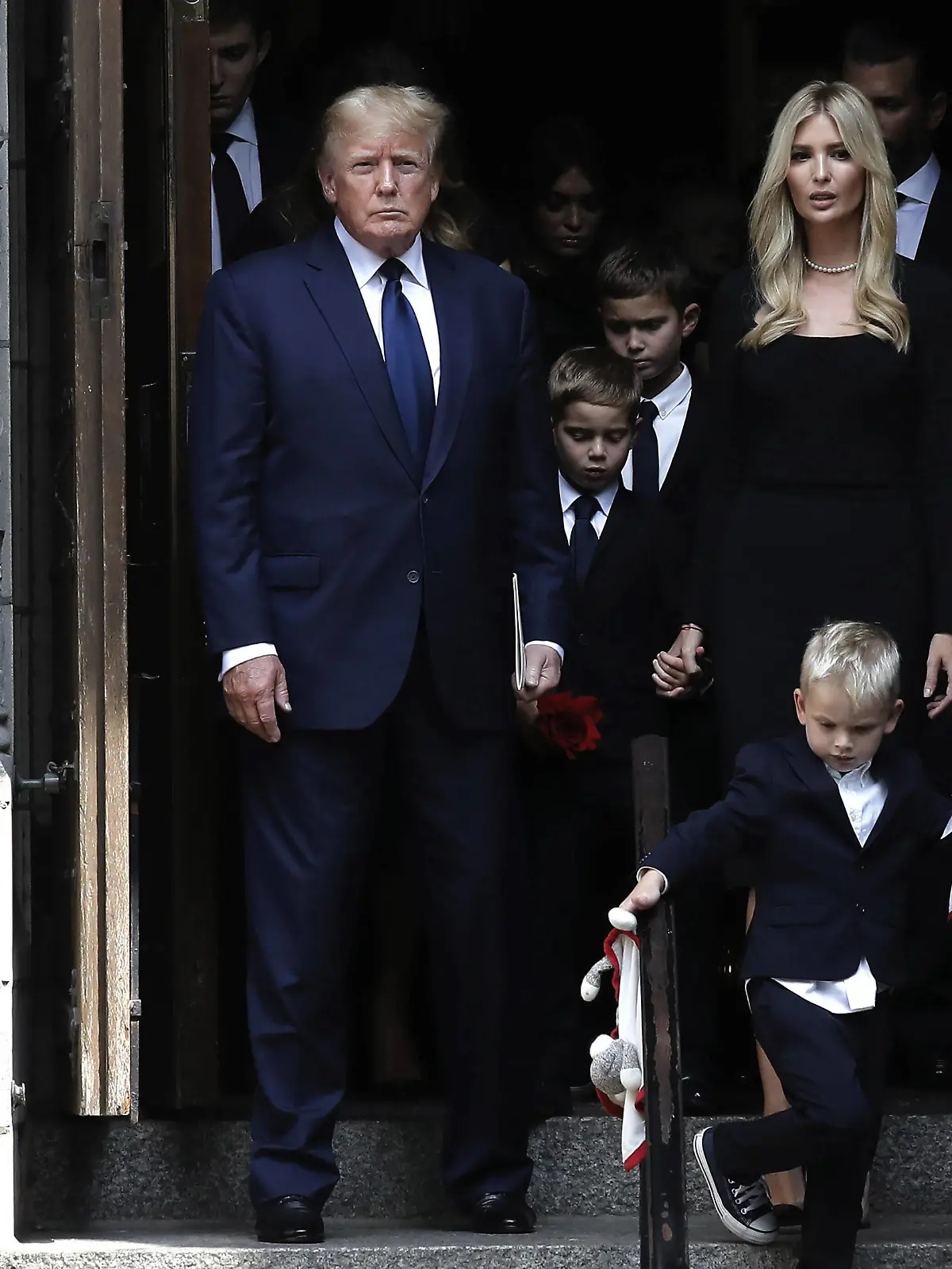  Former US President Donald, left, and his daughter Ivanka, center and his son Eric, right, and other members of the Trump family walk behind Ivana Trump, his first wife s coffin at St. Vincent Ferrer Roman Catholic Church on Lexington Avenue on Wednesday, July 20, 2022 in New York City. PUBLICATIONxINxGERxSUIxAUTxHUNxONLY NYP202207203016 PETERxFOLEY