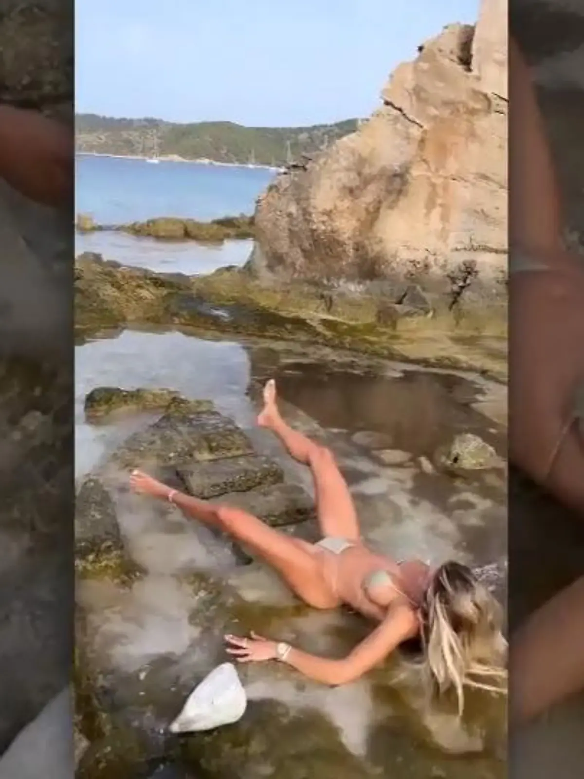 Playmate Khloë Terae liebt es zu posieren, aber ein Fels macht ihr einen Strich durch die Rechnung.