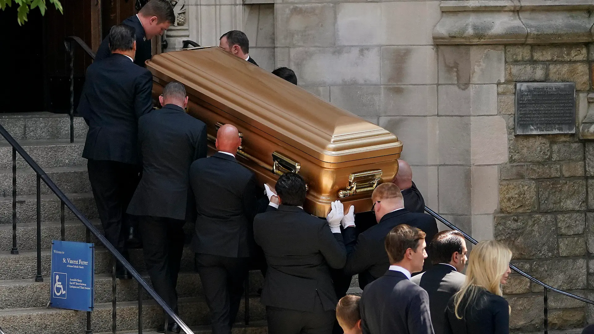 Pallbearers carry the casket of Ivana Trump into St. Vincent Ferrer Roman Catholic Church, Wednesday, July 20, 2022, in New York. Ivana Trump, an icon of 1980s style, wealth and excess and a businesswoman who helped her husband build an empire that launched him to the presidency, is set to be celebrated at a funeral Mass at St. Vincent Ferrer Roman Catholic Church following her death last week. (AP Photo/John Minchillo)