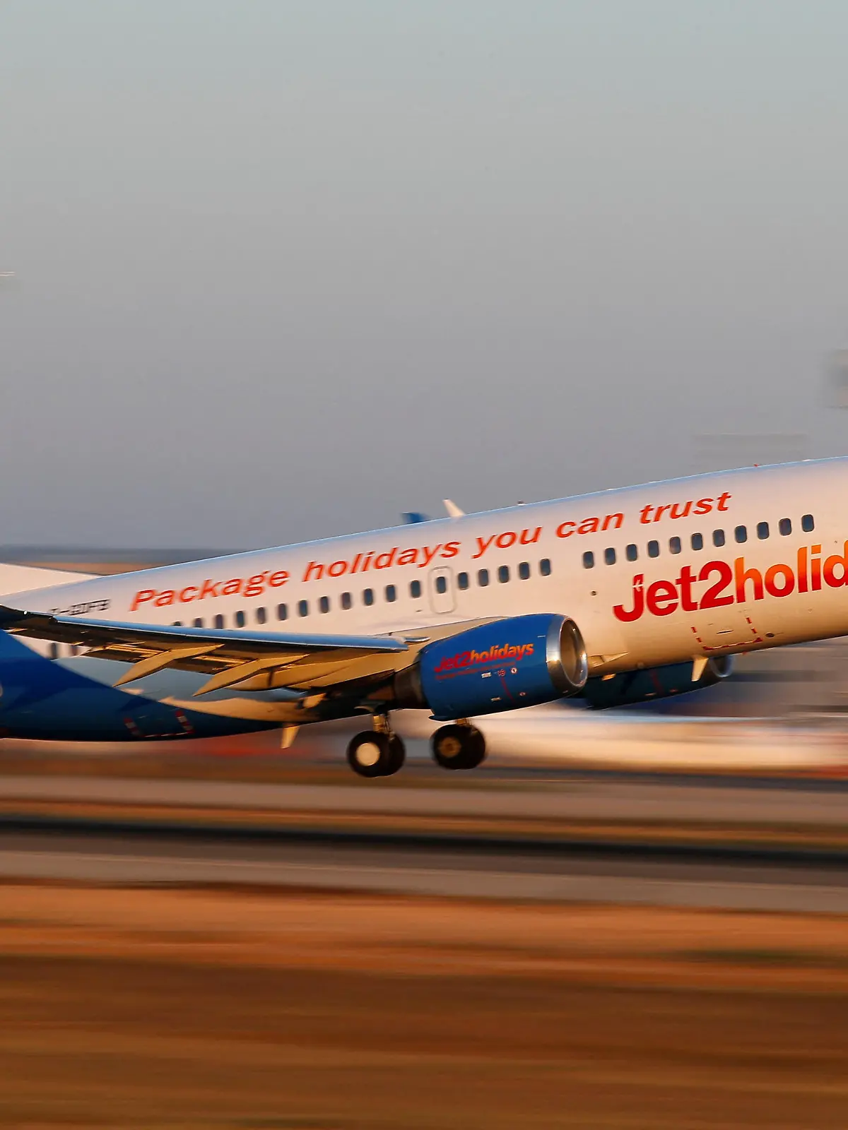 FILE PHOTO: A Jet2 Boeing 737-300 airplane takes off from the airport in Palma de Mallorca, Spain, July 29, 2018. Picture taken July 29, 2018.  REUTERS/Paul Hanna/File Photo