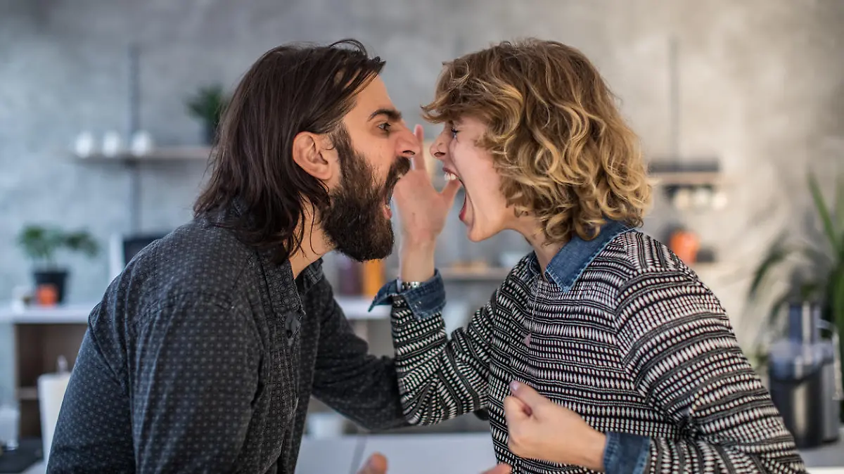 Man and woman, married couple arguing at home.