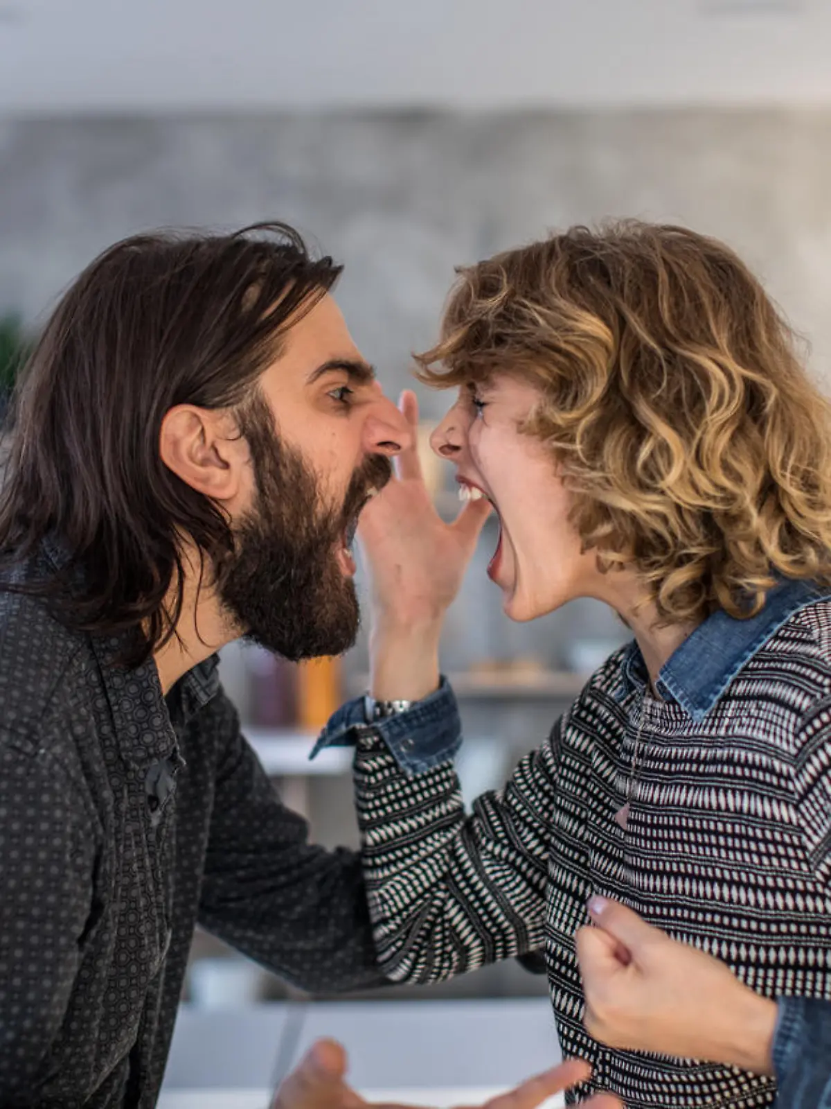 Man and woman, married couple arguing at home.