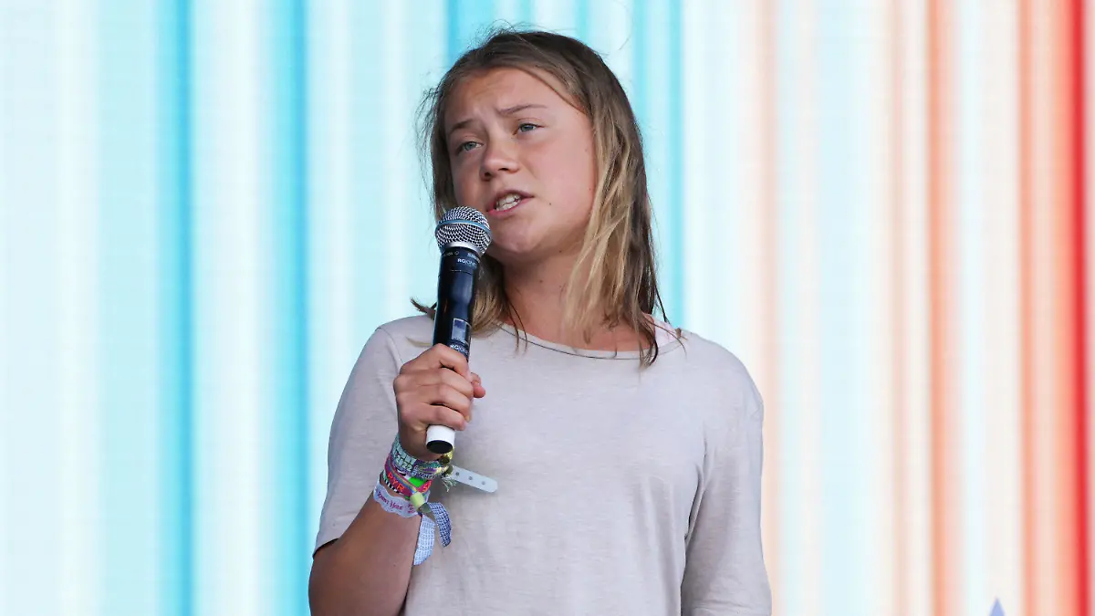 Greta Thunberg addresses the crowd at the Glastonbury Festival in Worthy Farm, Somerset, England, Saturday, June 25, 2022. (AP Photo/Scott Garfitt)