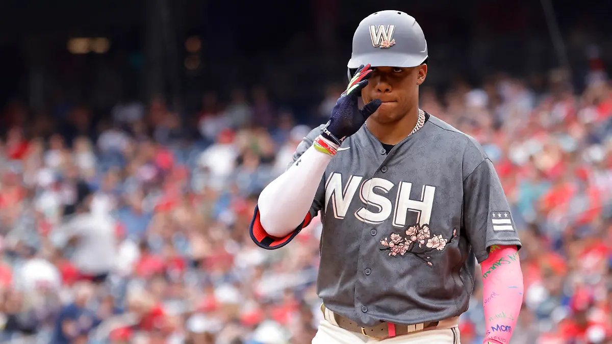 Jul 16, 2022; Washington, District of Columbia, USA; Washington Nationals right fielder Juan Soto (22) gestures to the Atlanta Braves dugout prior to his at-bat during the first inning at Nationals Park. Mandatory Credit: Geoff Burke-USA TODAY Sports