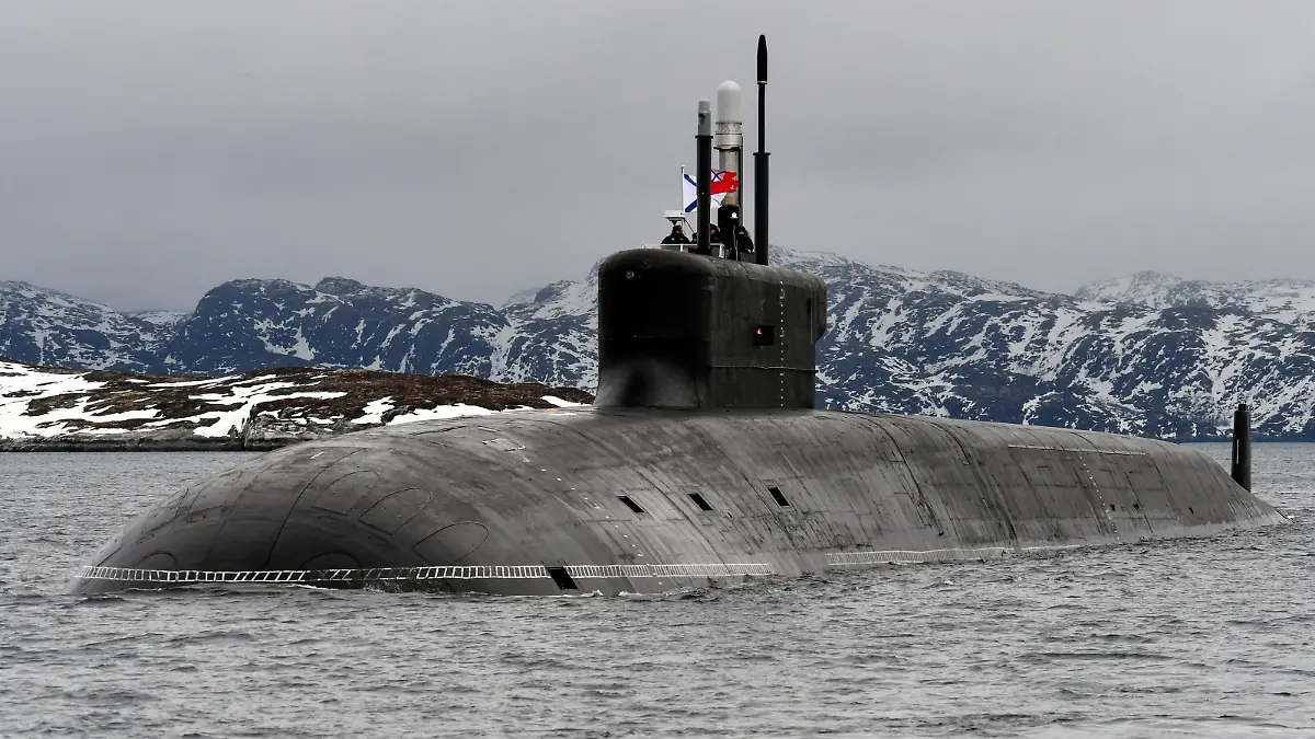 MURMANSK REGION, RUSSIA - MARCH 31, 2021: The Russian Navy nuclear-powered ballistic missile submarine Knyaz Vladimir enters Kola Bay off Russia's Barents Sea coast after taking part in an expedition to the Arctic Ocean. The Knyaz Vladimir submarine was laid down at Sevmash on 30 July 2012. It was built according to the upgraded Borei-A Project (Project 955A) and belongs to the fourth generation of nuclear-powered submarines built for the Russian Navy. Lev Fedoseyev/TASS