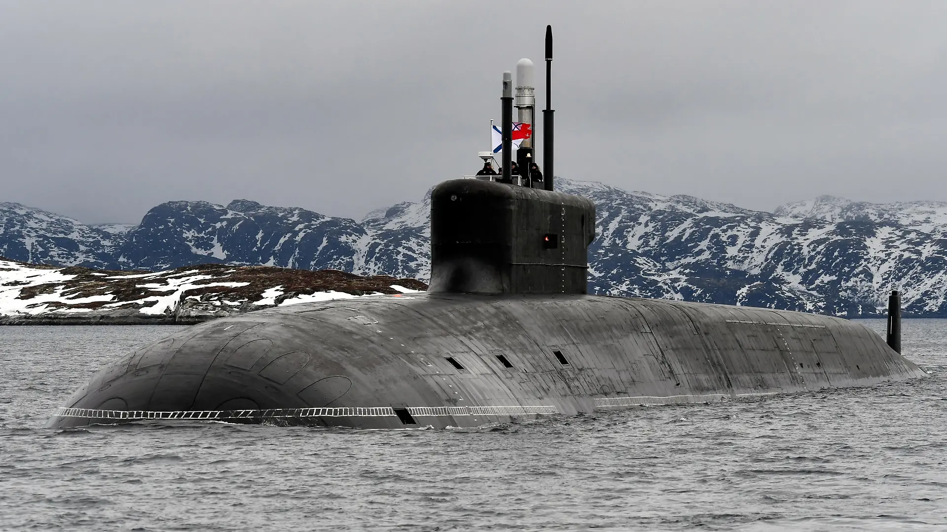 MURMANSK REGION, RUSSIA - MARCH 31, 2021: The Russian Navy nuclear-powered ballistic missile submarine Knyaz Vladimir enters Kola Bay off Russia's Barents Sea coast after taking part in an expedition to the Arctic Ocean. The Knyaz Vladimir submarine was laid down at Sevmash on 30 July 2012. It was built according to the upgraded Borei-A Project (Project 955A) and belongs to the fourth generation of nuclear-powered submarines built for the Russian Navy. Lev Fedoseyev/TASS