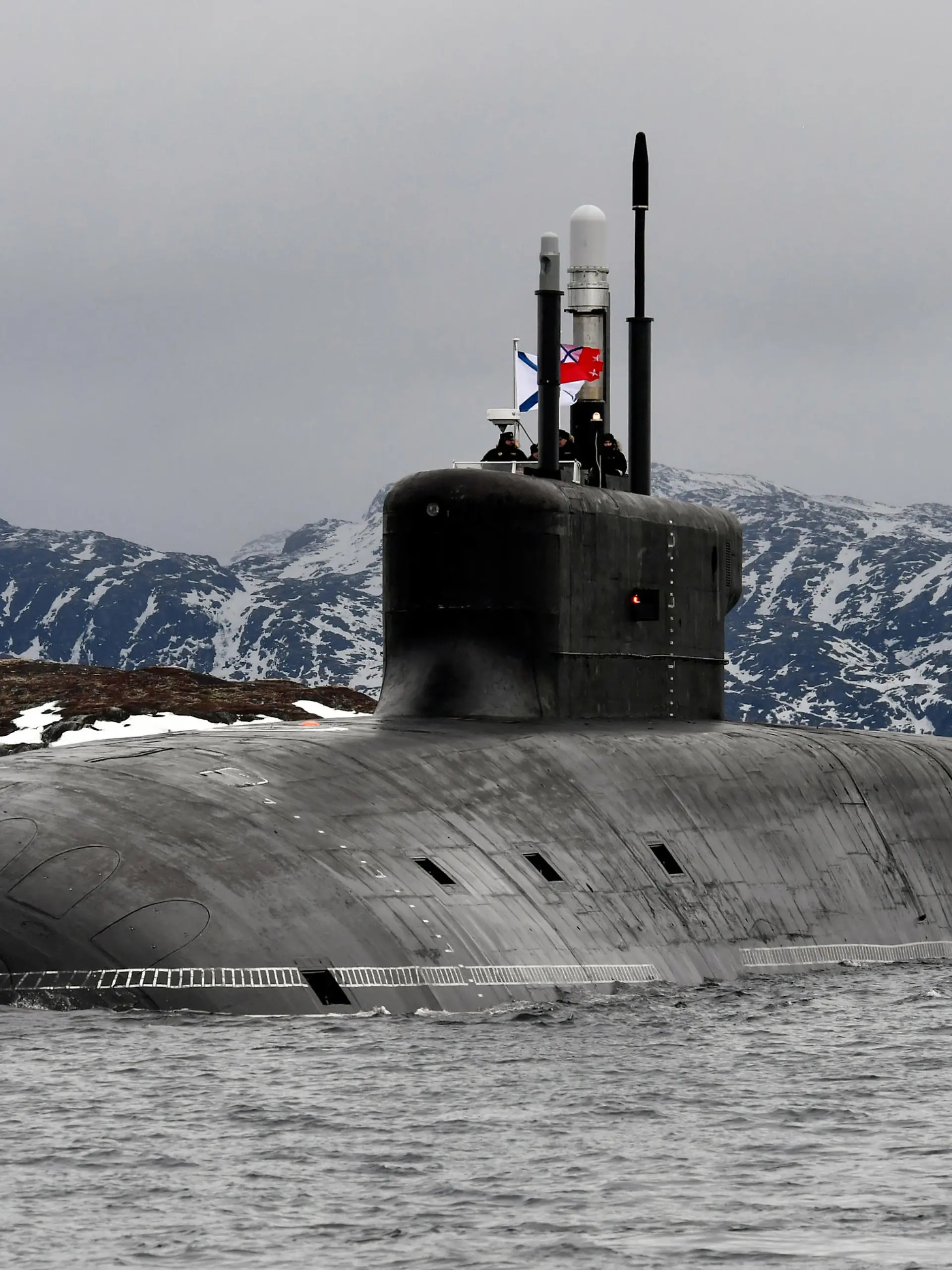 MURMANSK REGION, RUSSIA - MARCH 31, 2021: The Russian Navy nuclear-powered ballistic missile submarine Knyaz Vladimir enters Kola Bay off Russia's Barents Sea coast after taking part in an expedition to the Arctic Ocean. The Knyaz Vladimir submarine was laid down at Sevmash on 30 July 2012. It was built according to the upgraded Borei-A Project (Project 955A) and belongs to the fourth generation of nuclear-powered submarines built for the Russian Navy. Lev Fedoseyev/TASS