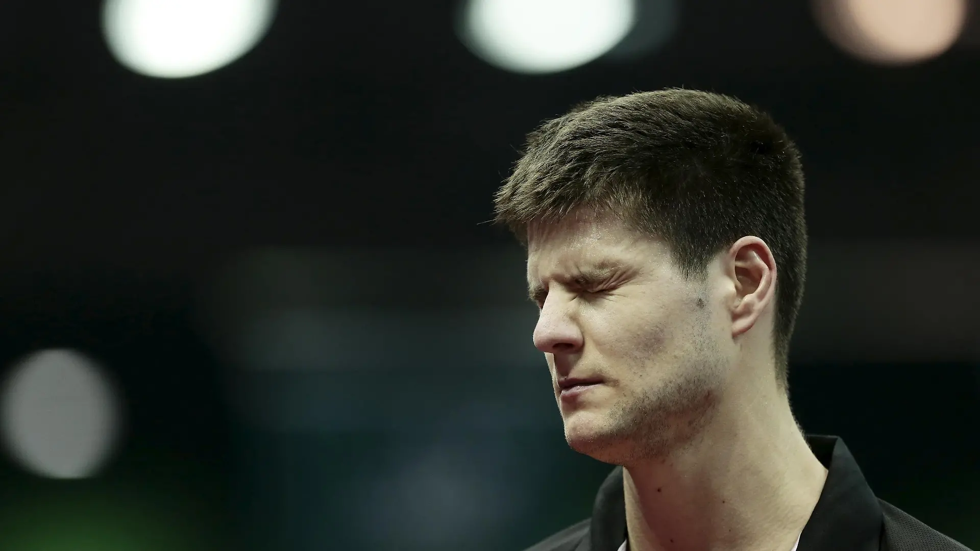 Germany's Dimitrij Ovtcharov reacts after losing a point against South Korea's Lee Sang-su in their men's singles second round match at the World Table Tennis Championships in Suzhou, Jiangsu province April 29, 2015. REUTERS/Aly Song