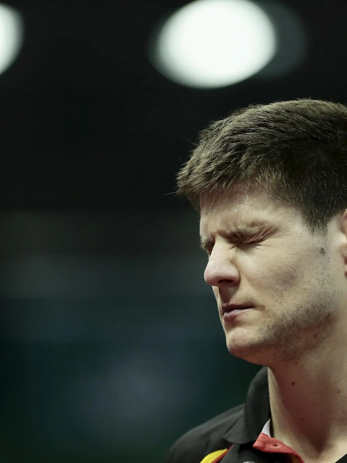 Germany's Dimitrij Ovtcharov reacts after losing a point against South Korea's Lee Sang-su in their men's singles second round match at the World Table Tennis Championships in Suzhou, Jiangsu province April 29, 2015. REUTERS/Aly Song