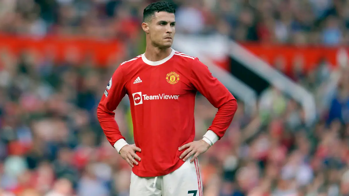 FILE- Manchester United's Cristiano Ronaldo stands on the pitch during the English Premier League soccer match between Manchester United and Norwich City at Old Trafford stadium in Manchester, England, on April 16, 2022. Amid doubts over Ronaldo's future at the club, Manchester United manager Erik ten Hag has said that Cristiano Ronaldo is “not for sale." The team is in Thailand for a preseason tour but the 37-year-old forward didn’t make the trip due to an unspecified family issue. (AP Photo/Jon Super, File)