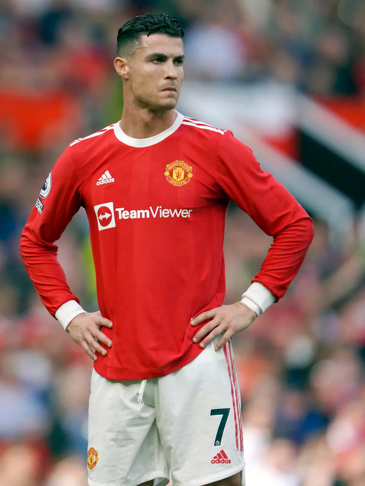 FILE- Manchester United's Cristiano Ronaldo stands on the pitch during the English Premier League soccer match between Manchester United and Norwich City at Old Trafford stadium in Manchester, England, on April 16, 2022. Amid doubts over Ronaldo's future at the club, Manchester United manager Erik ten Hag has said that Cristiano Ronaldo is “not for sale." The team is in Thailand for a preseason tour but the 37-year-old forward didn’t make the trip due to an unspecified family issue. (AP Photo/Jon Super, File)