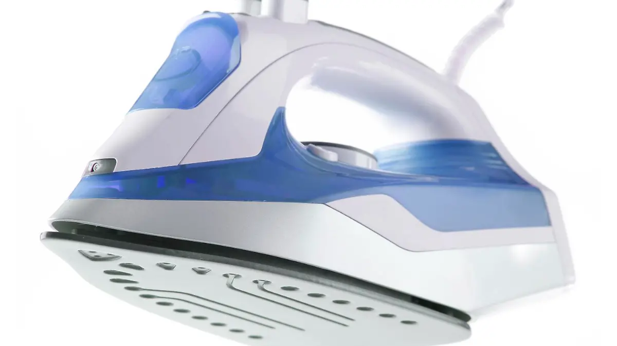Modern electric iron isolated on white background