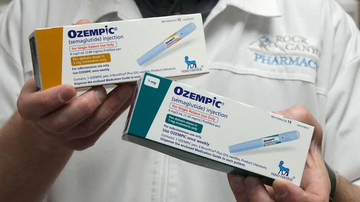 FILE PHOTO: A pharmacist displays boxes of Ozempic, a semaglutide injection drug used for treating type 2 diabetes and obesity made by Novo Nordisk, at Rock Canyon Pharmacy in Provo, Utah, U.S. March 29, 2023. REUTERS/George Frey/File Photo